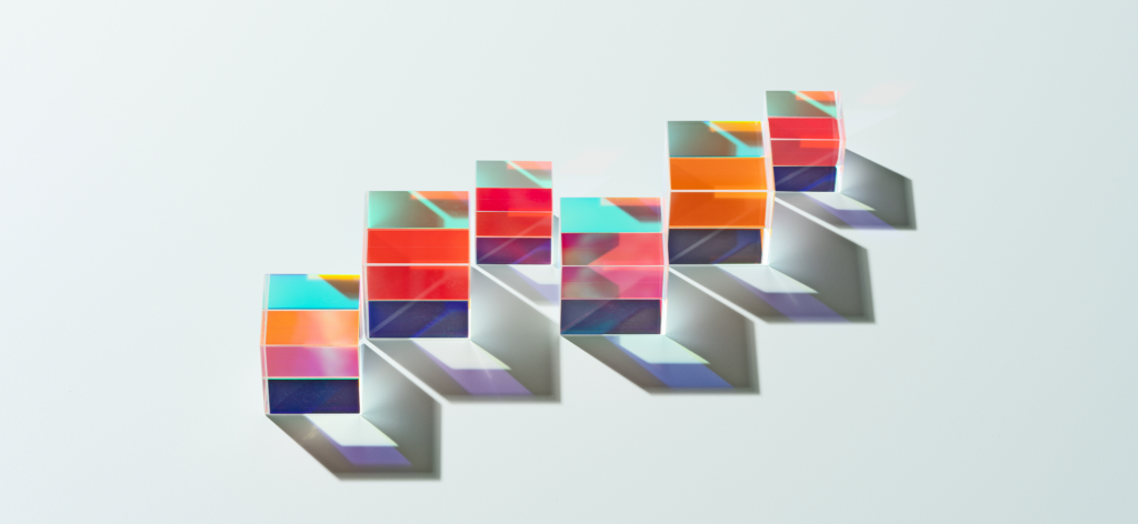 Transparent Cube Prisms Arrangement Into a Line Graph - stock photo